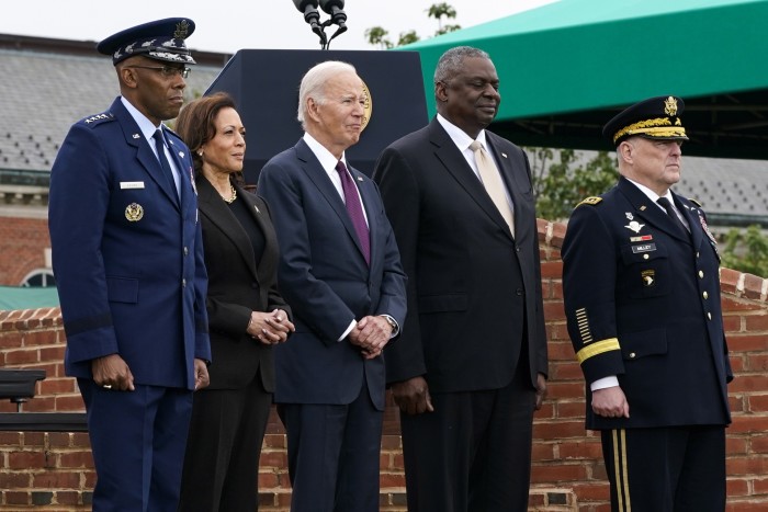 CQ Brown, with Kamala Harris, Joe Biden and defence secretary Lloyd Austin, as well as the man he will be replacing — Mark Milley