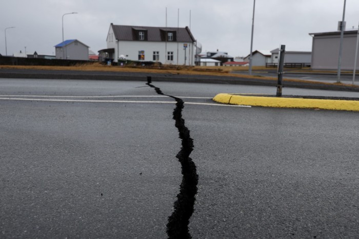 Crack in road caused by volcanic activity