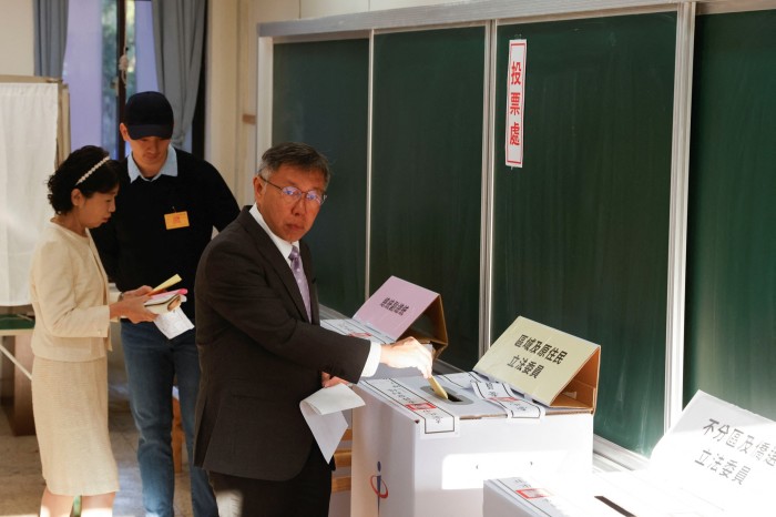Ko Wen-je, presidential candidate of Taiwan People’s Party, casts his vote during the presidential and parliamentary elections in Taipei