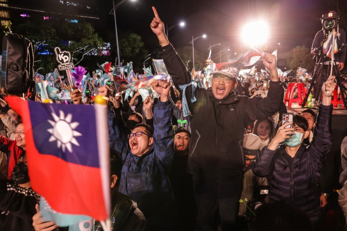 Taiwan People’s party supporters await the results of the election in New Taipei City on Saturday