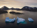 Large icebergs float away at sunrise near Kulusuk, Greenland. Donald Trump reiterated his desire for the United States to buy Greenland, the largest island in the world.